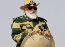 মোদির গায়ে সেনার পোশাক, সমালোচনার ঝড়।