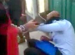 শিক্ষিকার আপত্তিকর ভিডিও ভাইরালের হুমকি, অধ্যক্ষকে জুতাপেটা।