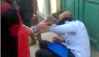 শিক্ষিকার আপত্তিকর ভিডিও ভাইরালের হুমকি, অধ্যক্ষকে জুতাপেটা।